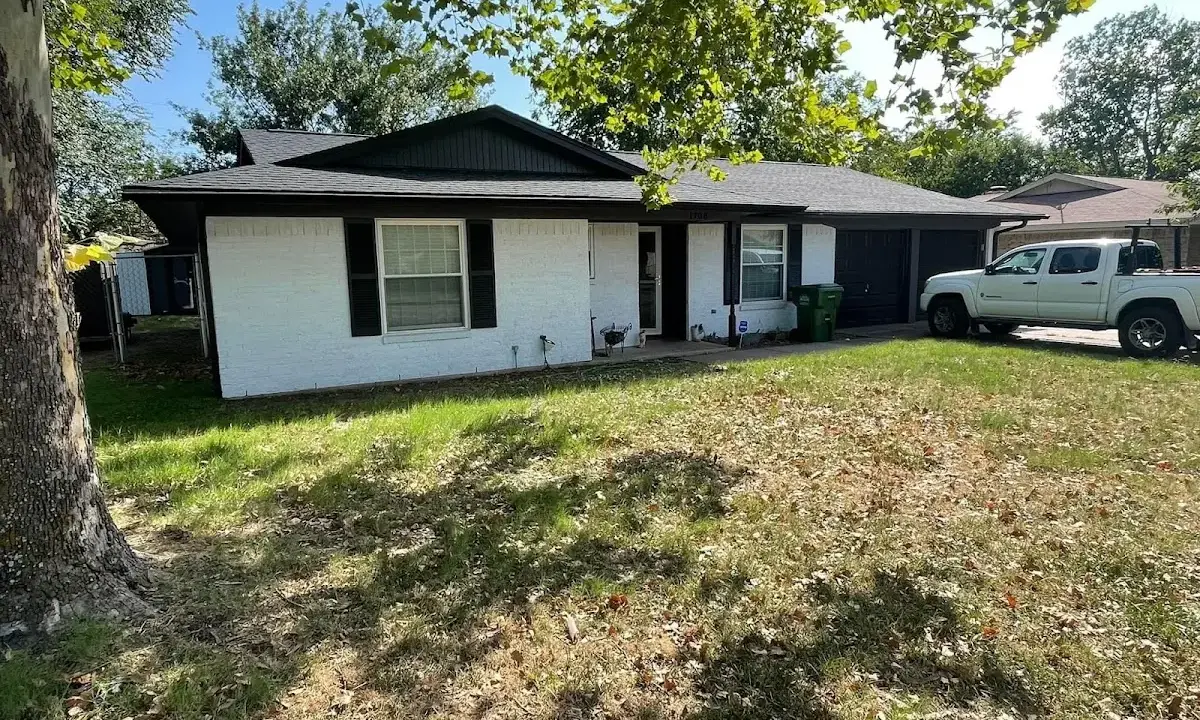 Professional roofing crew working on a residential roof in Allentown